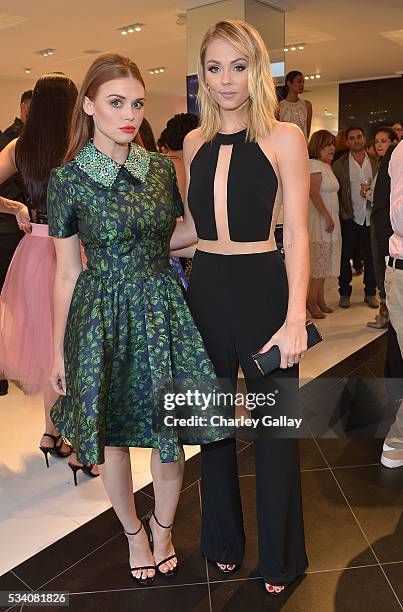 Holland Roden and Laura Vandervoort attend the Jovani L.A. Flagship Opening on May 24, 2016 in Beverly Hills, California.