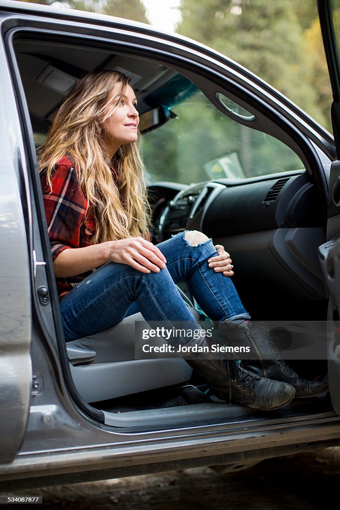 A woman in a flannel shirt