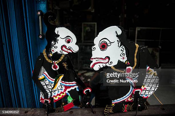 Two shadow puppets in Wukirsari, Imogiri, Bantul, Yogyakarta, Indonesia on May 23, 2016. Shadow puppets are made of buffalo skin an Indonesian...