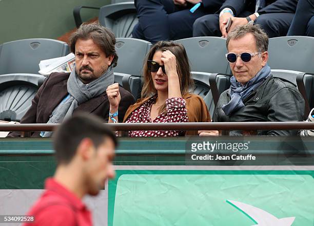 Henri Leconte, Charles Berling attend day 3 of the 2016 French Open held at Roland-Garros stadium on May 24, 2016 in Paris, France.