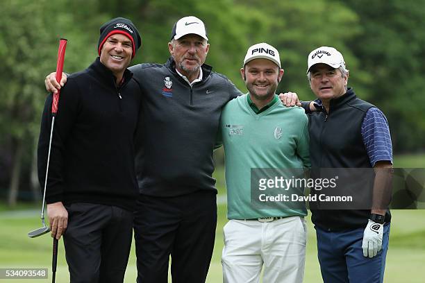 Andy Sullivan of England poses with former cricketers Shane Warne , Sir Ian Botham and Allan Lamb during the Pro-Am prior to the BMW PGA Championship...