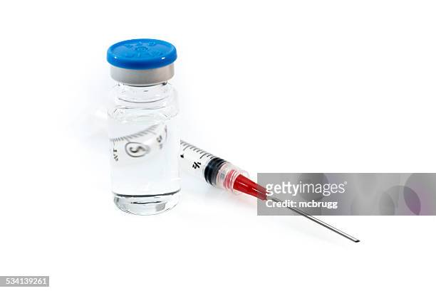 syringe with injection needle and medicine bottle - injecting iv stock pictures, royalty-free photos & images