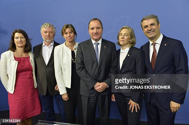 Swedish Prime Minister Stefan Lofven poses with new cabinet ministers Ann Linde , EU and trade; Peter Eriksson , housing and digitizing; Isabella...
