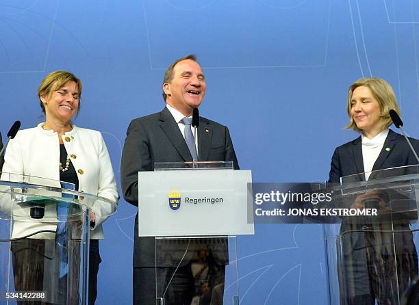 Swedish Prime Minister Stefan Lofven laughs with new cabinet ministers Isabella Lovin , international development and climate and Karolina Skog ,...