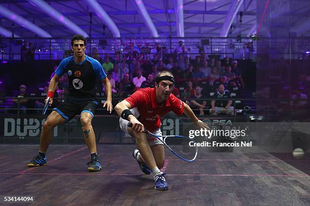 Simon Rosner of Germany competes against Omar Mosaad of Egypt during day two of the PSA Dubai World Series Finals 2016 at Burj Park on May 25, 2016...