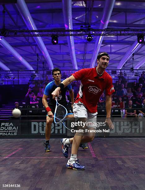 Simon Rosner of Germany competes against Omar Mosaad of Egypt during day two of the PSA Dubai World Series Finals 2016 at Burj Park on May 25, 2016...