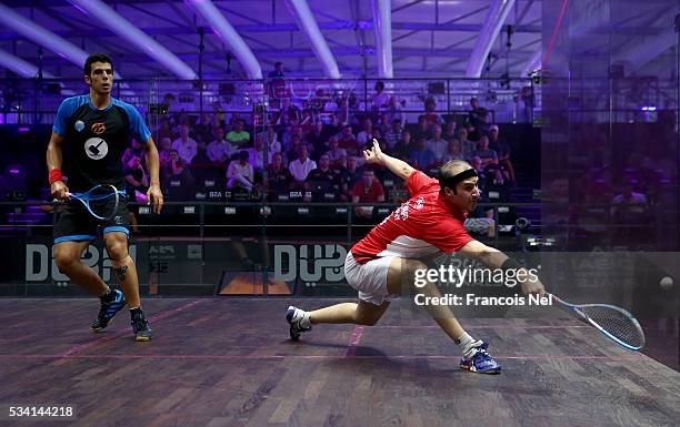 Simon Rosner of Germany competes against Omar Mosaad of Egypt during day two of the PSA Dubai World Series Finals 2016 at Burj Park on May 25, 2016...