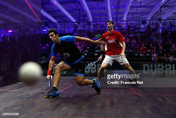 Omar Mosaad of Egypt competes against Simon Rosner of Germany during day two of the PSA Dubai World Series Finals 2016 at Burj Park on May 25, 2016...