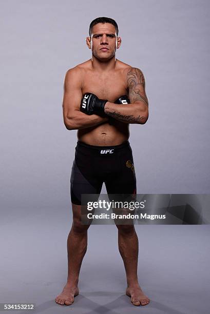 Lightweight champion Rafael dos Anjos poses for a portrait during a UFC photo session on January 19, 2016 in Las Vegas, Nevada.