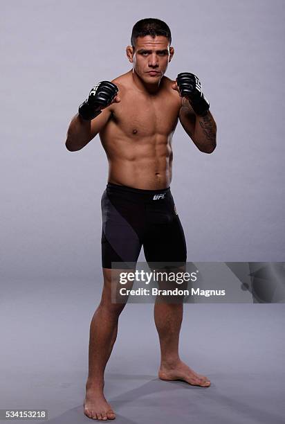 Lightweight champion Rafael dos Anjos poses for a portrait during a UFC photo session on January 19, 2016 in Las Vegas, Nevada.