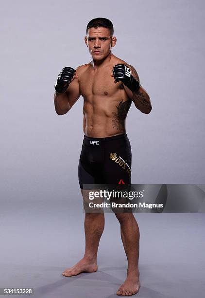 Lightweight champion Rafael dos Anjos poses for a portrait during a UFC photo session on January 19, 2016 in Las Vegas, Nevada.