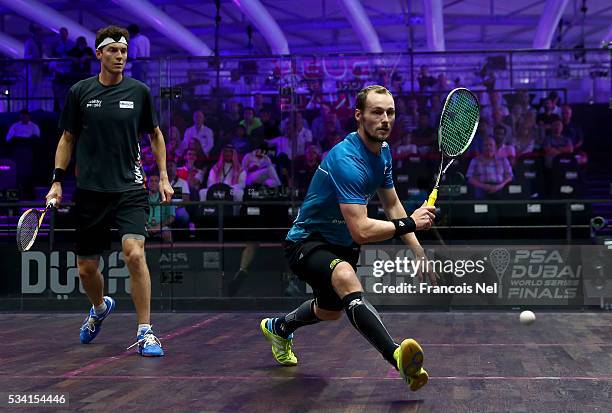 Gregory Gaultier of France competes against Cameron Pilley of Australia during day two of the PSA Dubai World Series Finals 2016 at Burj Park on May...