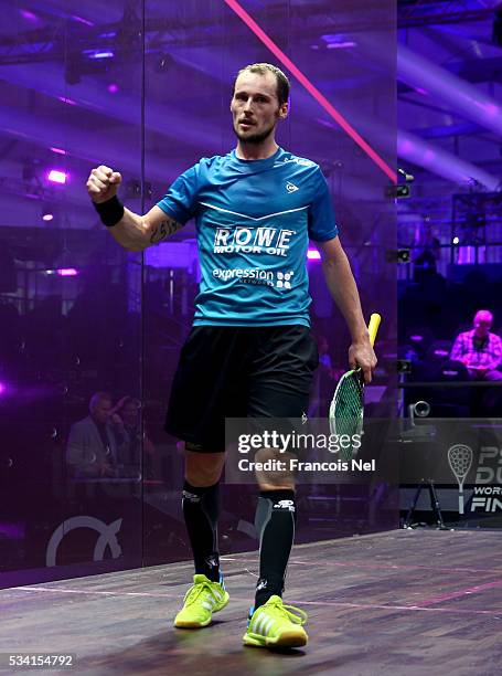 Gregory Gaultier of France celebrates after winning his match against Cameron Pilley of Australia during day two of the PSA Dubai World Series Finals...