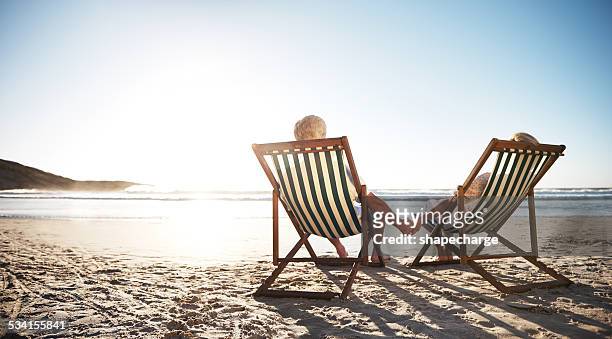 our love will never end - old couple holding hands stock pictures, royalty-free photos & images