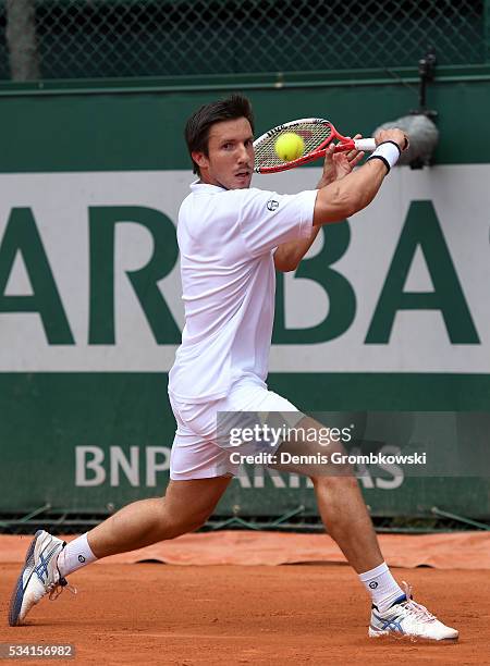 Igor Sijsling of Netherlands hits a backhand during the Men's Singles second round match against Nick Kyrgios of Australia on day four of the 2016...