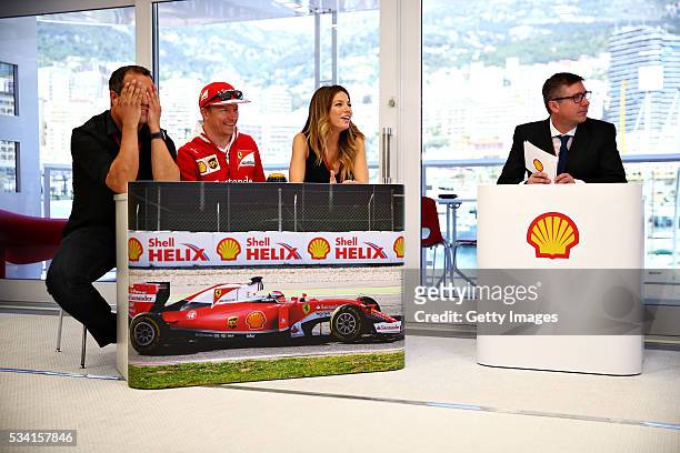 The team of Kimi Raikkonen of Finland and Ferrari, at the Shell F1 quiz, with Ted Kravitz, Sky Sports F1, Federica Masolin, Sky F1 Italy and host...