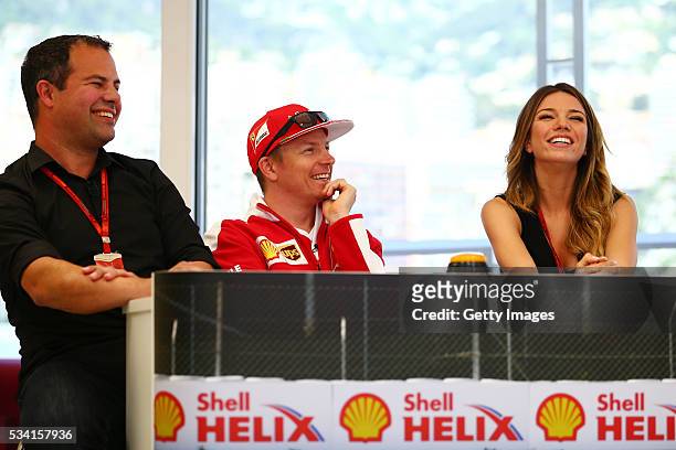 The team of Kimi Raikkonen of Finland and Ferrari, at the Shell F1 quiz, with Ted Kravitz, Sky Sports F1, and Federica Masolin, Sky F1 Italy during...