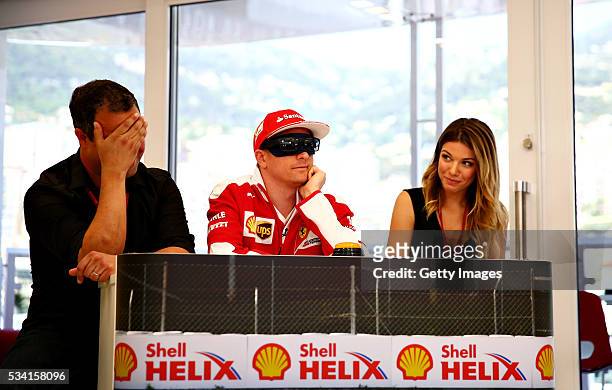 Kimi Raikkonen of Finland and Ferrari prepares for the mystery guest round with team mates, Ted Kravitz, Sky Sports F1, and Federica Masolin, Sky F1...