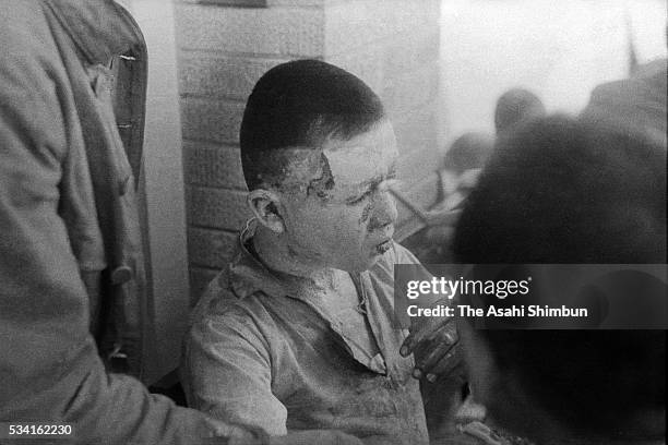 An a-bomb survivor waits for medical treatment at the Hiroshima Red Cross hospital on August 10, 1945 in Hiroshima, Japan. The world's first atomic...