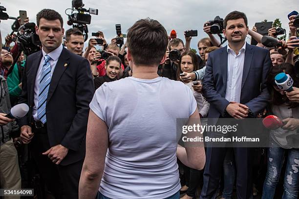 Ukrainian military pilot Nadiya Savchenko is surrounded by media upon her arrival at Kyiv Boryspil Airport on May 25, 2016 in Boryspil, Ukraine....