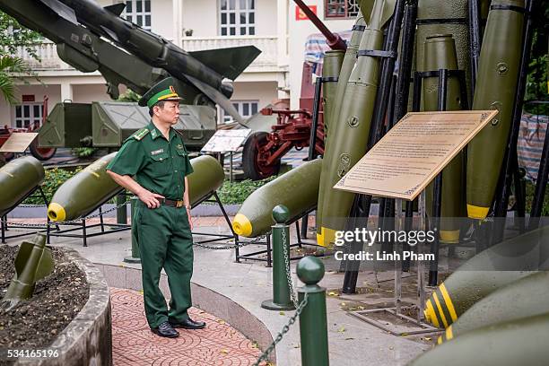 Military officer watches an bomb exhibition at Vietnam Military History Museum on May 25, 2016 in Hanoi, Vietnam. U.S. President Obama made his...