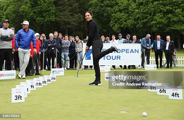 Henni Zuel reacts in the ISPS HANDA Pressure Putt Showdown prior to the BMW PGA Championship at Wentworth on May 25, 2016 in Virginia Water, England.