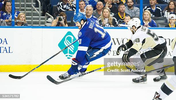 Brian Boyle of the Tampa Bay Lightning skates against Kris Letang of the Pittsburgh Penguins during the third period of Game Three of the Eastern...