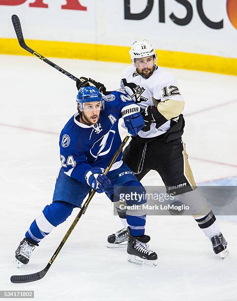 Ryan Callahan of the Tampa Bay Lightning skates against Ben Lovejoy of the Pittsburgh Penguins during the third period of Game Three of the Eastern...