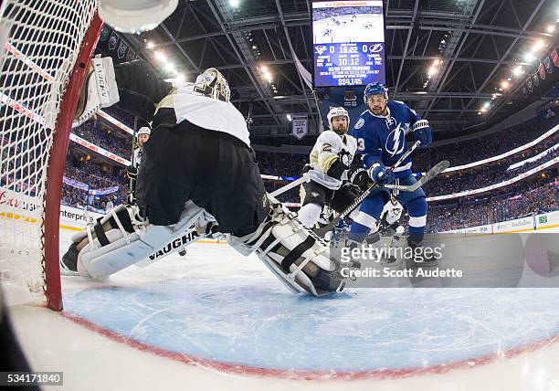 Brown of the Tampa Bay Lightning skates against goalie Matt Murray of the Pittsburgh Penguins during the second period of Game Three of the Eastern...