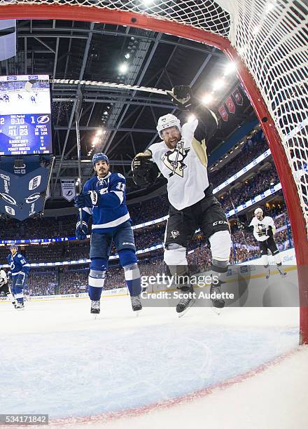 Phil Kessel of the Pittsburgh Penguins celebrates a goal during the third period against the Tampa Bay Lightning during Game Three of the Eastern...