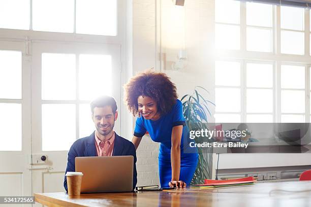 brainstorming in modern office loft apartment. - team blue stock pictures, royalty-free photos & images