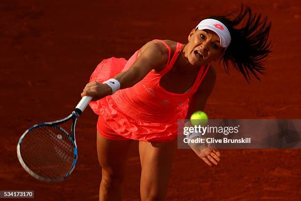 Agnieszka Radwanska of Poland serves during the Women's Singles second round match against Caroline Garcia of France on day four of the 2016 French...