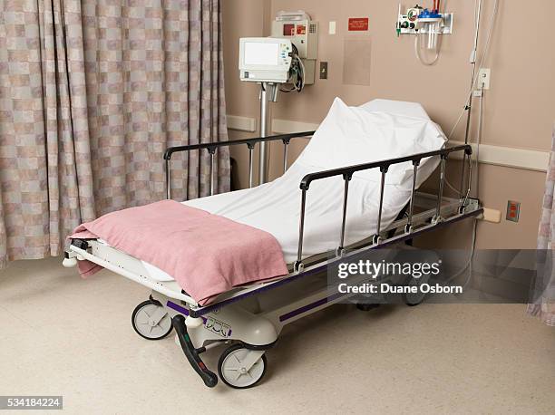 empty hospital bed - archival hospital stock pictures, royalty-free photos & images