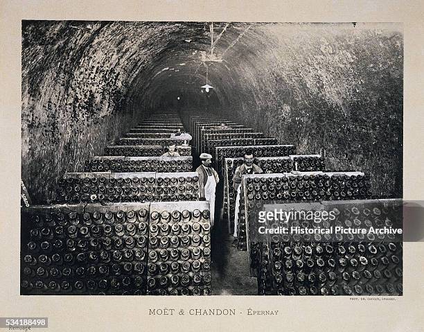 Winemakers Storing Moet et Chandon Champagne in Caves