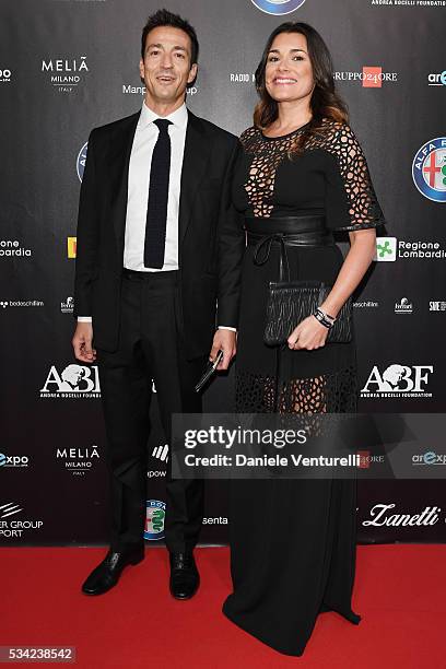 Alena Seredova and Alessandro Nasi walk the red carpet of Bocelli and Zanetti Night on May 25, 2016 in Rho, Italy.