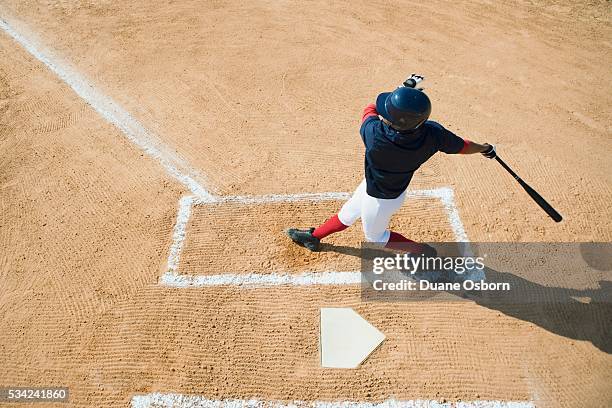 batter swinging - child batting stock pictures, royalty-free photos & images