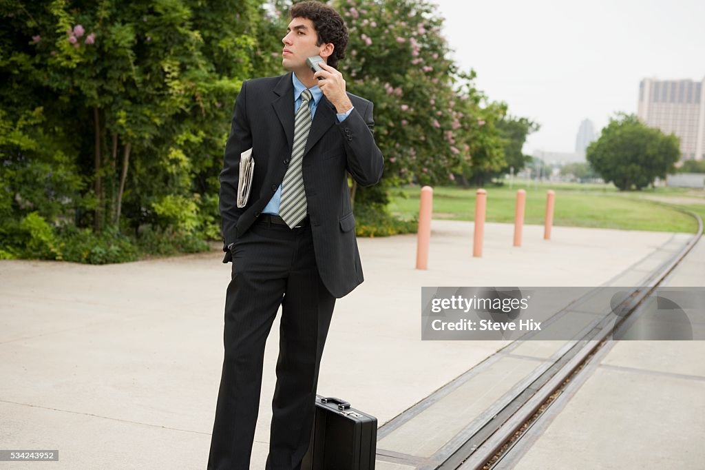 Businessman Shaves As He Waits for His Train
