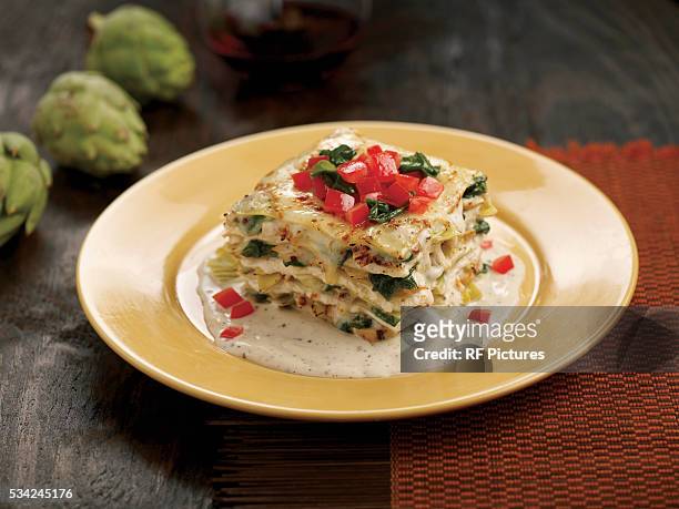 plate with piece of lasagna - lasagna stock pictures, royalty-free photos & images