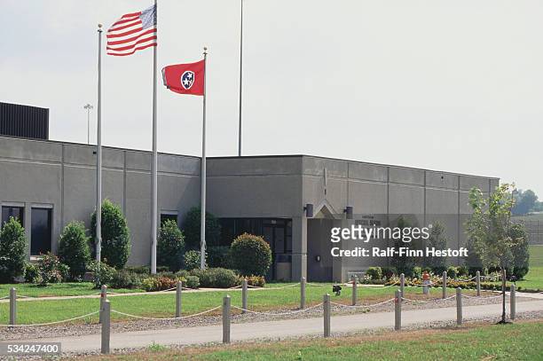 An American flag and the flag of Tennessee fly outside the Lois M. DeBerry Special Needs Facility in Nashville. The special needs prison facility...