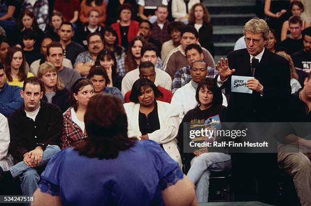 Talk show host Jerry Springer talks to a guest on The Jerry Springer Show. The show's topic was "I Am A Slave To My 600 lb. Wife."