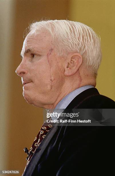 United States Senator from Arizona John McCain speaks to students in Fisk Hall at Northwestern University. A scar from recent surgery due to skin...