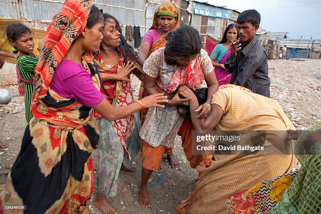 A fight breaks out among women queuing for limited water access in a ...