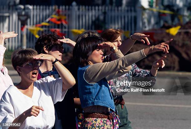 Onlookers stare in shock at the site of the destroyed Federal Building in the aftermath of the Oklahoma City bombing. On April 19 a...