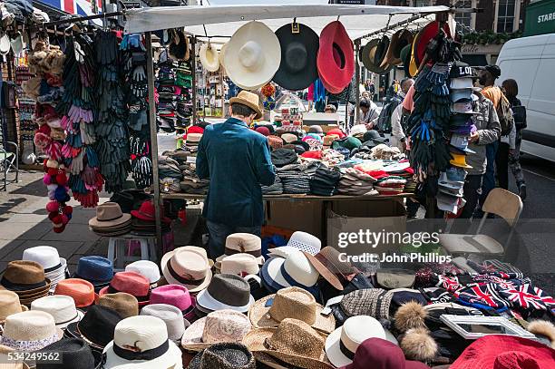 if the hat fits... - portobello stock pictures, royalty-free photos & images