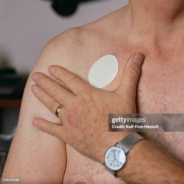 Nicotine Patch on Man's Chest