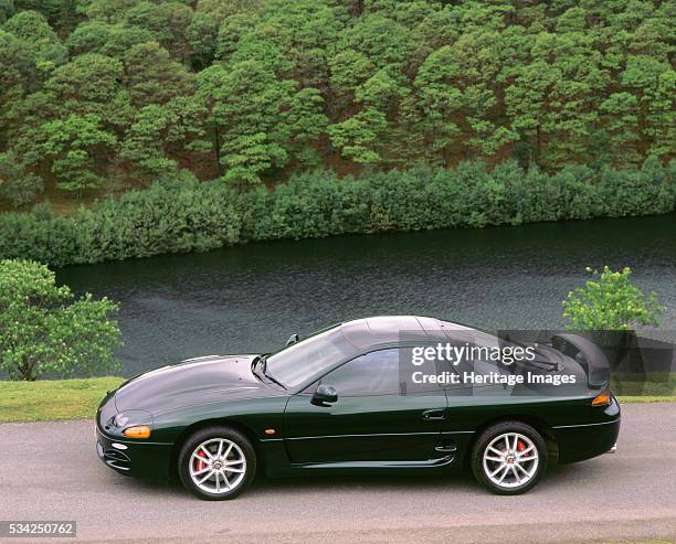 Mitsubishi 3000 Gt by a Welsh resevoir, 2000.