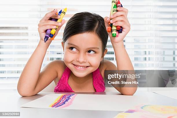 young girl with crayons - kid holding crayons stock pictures, royalty-free photos & images