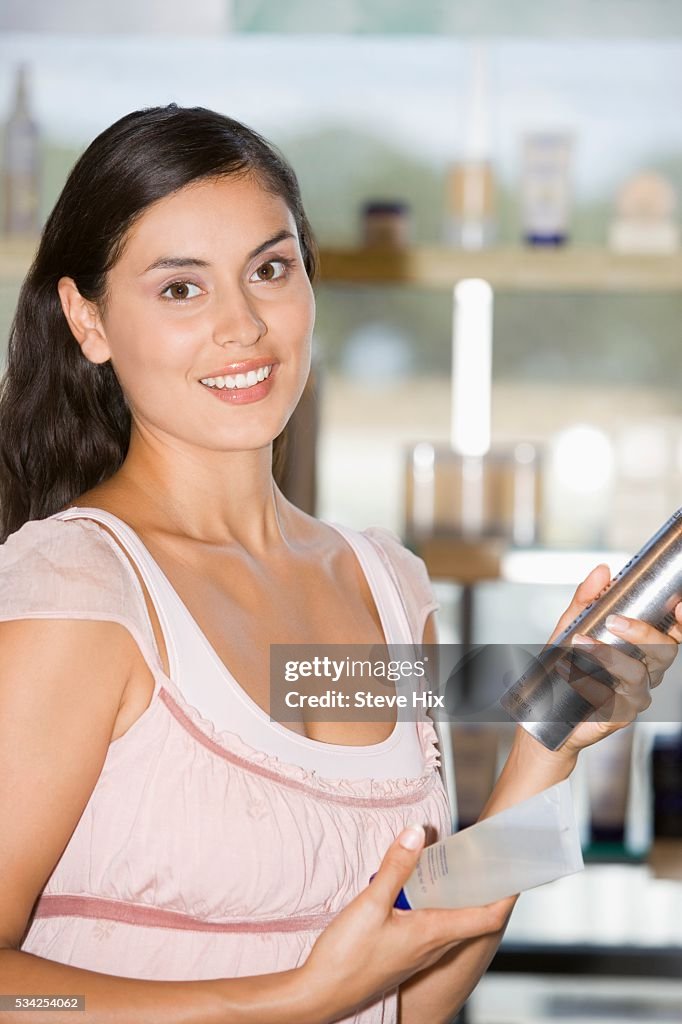 Woman Choosing Hair Care Products