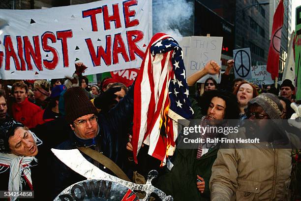 Anti-War demonstrators in Chicago burn a flag in protest of the Persian Gulf War. In 1990, U.S. Forces were sent to the Persian Gulf region in...