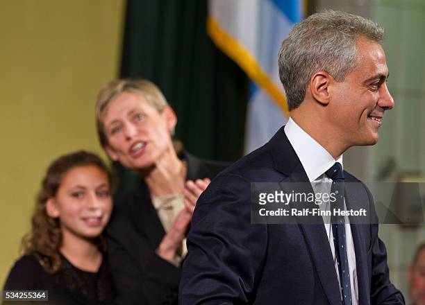 Amy Rule, wife of former White House Chief of Staff Rahm Emanuel and their daughter Ilana watch as Emanuel announces his candidacy for Mayor of...